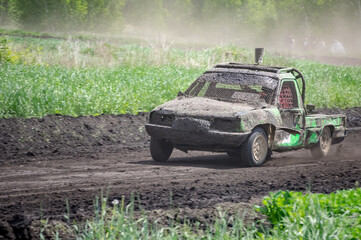 autocross on trucks and cars in summer, dirt, heat, dust