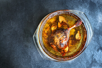 duck confit leg baked poultry meat Menu concept serving size. food background top view copy space for text organic healthy eating keto or paleo diet