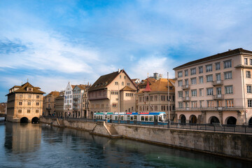 Fototapeta na wymiar Zurich cityscape with old architecture and Limmat river at sunrise