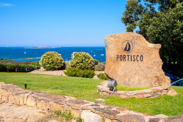 Portisco, Sardinia, Italy - Welcome stone and sign of yacht marina and port of Portisco resort town - Marina di Portisco - at Costa Smeralda Emerald Cost of Tyrrhenian Sea