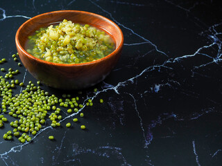Green beans, mung beans in syrup. Popular Thai desserts in a wooden bowl