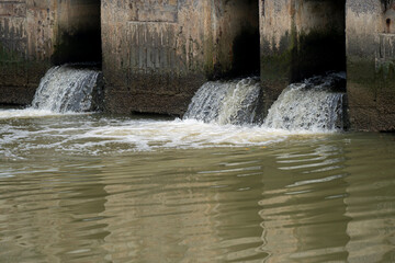 waste water industry flowing into the river