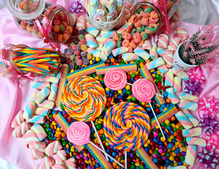 Beautiful colorful lollipops, perfect for setting up a complete table of sweets, as well as very delicious.