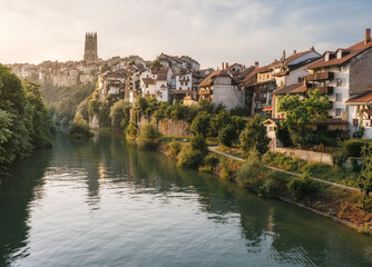 View of the historic architecture and the river Sarine in Fribourg - Switzerland - obrazy, fototapety, plakaty