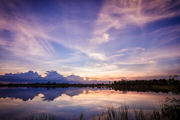 Fototapeta na wymiar sunset with reflection on the lake