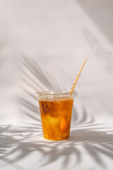 cup of cold orange drink 