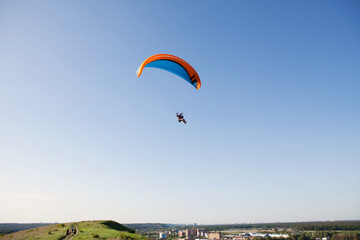 Glider pilot flying on glider. Skydiving flying. Parachute extreme sport.