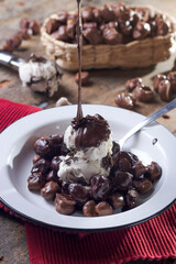 Sweet popcorn with chocolate icing and ice cream