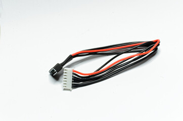 Close up of a black and red wire isolated on a white background 
