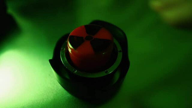 Man Finger Pressing Nuclear red Button