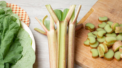Rhubarb is placed on the kitchen table for cooking
