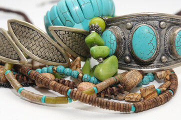 fragments of jewelry in boho style: beads, bracelets, necklaces