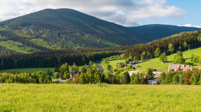 Filipovice settlement bellow Cervenohorsks sedlo sadle with hilly suroounding in Jeseniky mountains in Czech republic