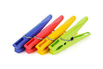 Color plastic clothespins isolated on white background. Plastic clips. Close-up. Full depth of field.