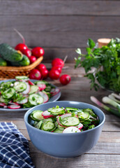 Fresh vegetable salad on table