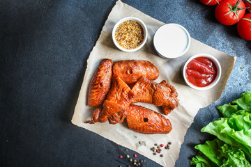 smoked chicken wings
meat poultry barbecue grill
Menu concept serving size. food background top view copy space