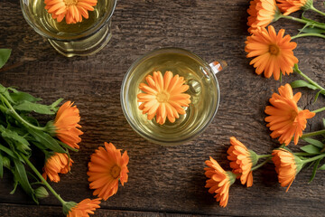Calendula tea with fresh calendula flowers