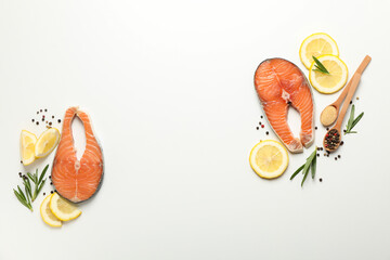 Composition with salmon meat and spices on white background, top view