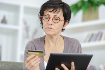a woman is shopping online