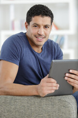 handsome man using a tablet