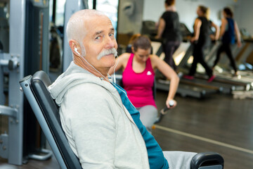 senior man training in gym