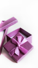 The violet present box on a white background