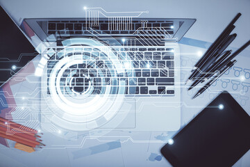 Multi exposure of data drawing hologram over topview of study desk background with computer. Concept of technology.