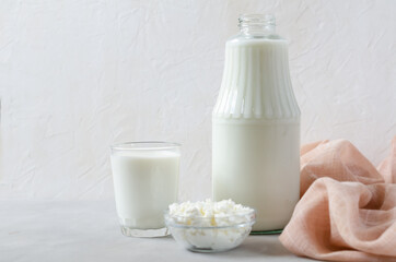 Homemade fermented beverage in a glass - kefir, cottage cheese, on a white background. Sour milk drink, yeast for yeast bacterial fermentation, intestinal health concept. Fashionable food and drinks