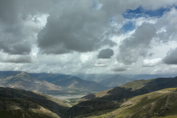 Highpass in Tibet not far away from Lhasa with clouds hanging very low