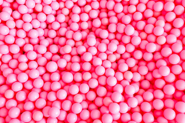 Background of pink balloons in a dry pool. Copy space