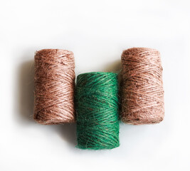 Tree coil of jute rope for packing on a white background.