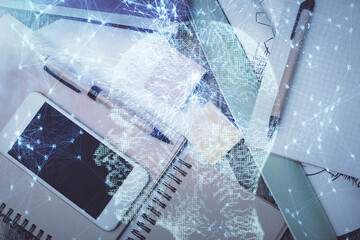 Double exposure of brain drawing over work table desktop. Top view. Global data analysis concept.