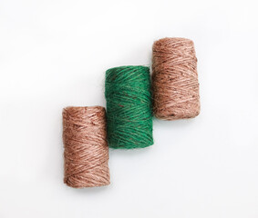 Tree coil of jute rope for packing on a white background.