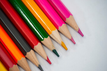 A group of pencils of assorted colours