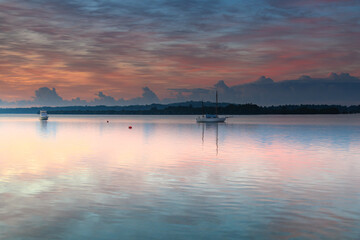 Sunrise Waterscape with High Cloud and Boats