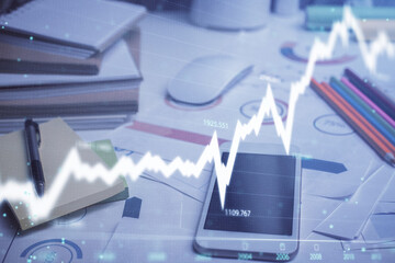 Fototapeta premium Double exposure of forex graph drawing and cell phone background. Concept of financial data analysis