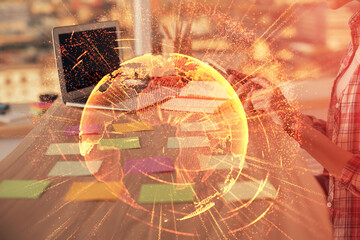 Double exposure of woman hands typing on computer and social network theme hologram drawing. People media concept.
