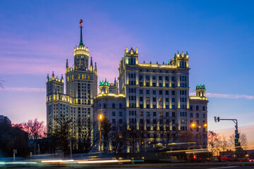 Sunset over night car movement in the city.