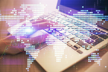 Double exposure of woman hands typing on computer and business theme hologram drawing. Success concept.