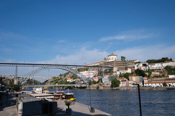 Naklejka premium Ribeira and a view of the Dom Luis I Bridge in Porto, Portugal.