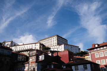 The facades of houses against the blue sky  in the old center of Porto, Portugal.