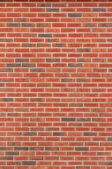 Fototapeta premium Vintage red and brown peppered look clay brick wall background