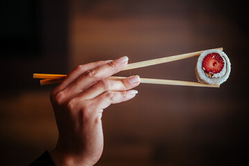 sushi with chopsticks