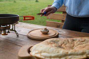 slicing champignon mushrooms for cooking