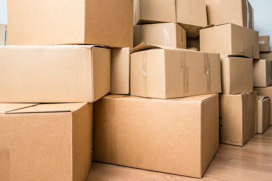 Detail Of Many Cardboard Boxes Full Of Household Items During A Move.