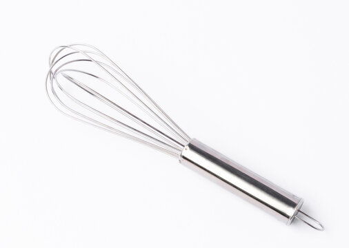 stainless steel whisk on white background