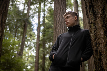 young man in the forest