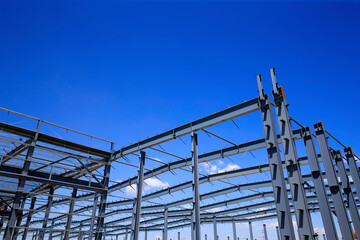 Steel frame structure factory building, in the blue sky and white clouds background