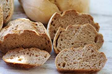 closeup of portuguese bread, slices on table