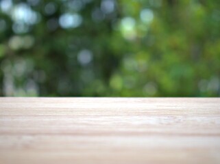 Empty wood table top on blur flowers garden background ,nature abstract blurred, display product, balnk table